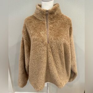 Soft and cozy tan zip up sweater